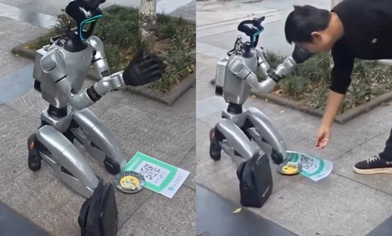 कैमरे के लेंस से Video of a robot begging goes viral.